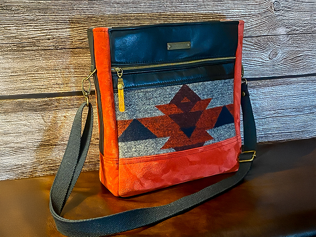 Handmade leather bags created start-to-finish by a single maker, showcasing individual craftsmanship and personal attention to detail